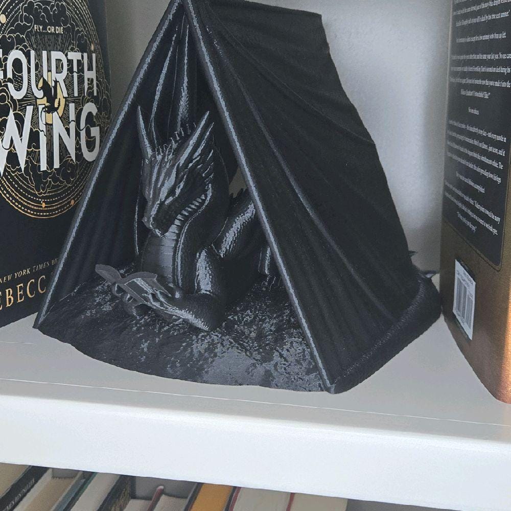 dragon reading book wyrm page holder